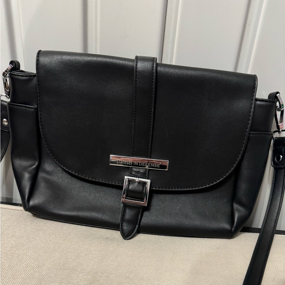 Damsel in defense purse